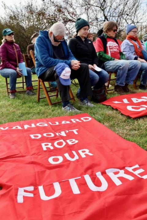 Members of the Earth Quaker Action Team and their supporters gather for a prayerful protest to urge Vanguard to stop investing in fossil fuels on Nov. 15.